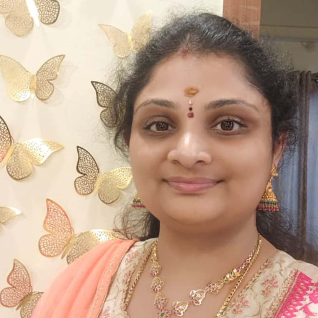 Tejaswini Kurmapu in traditional attire with golden butterfly decorations